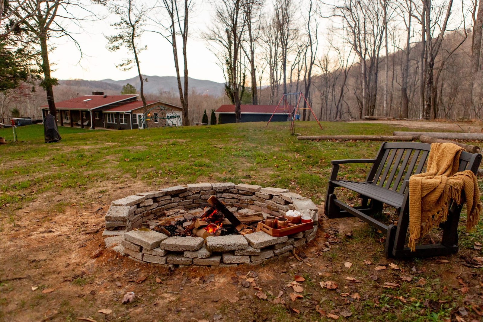 Fire pit and autumn mountains at Big Rock Falls